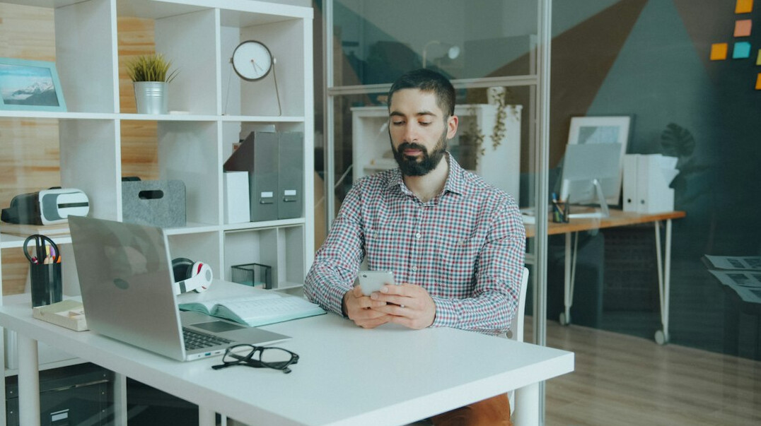 man meditating in office