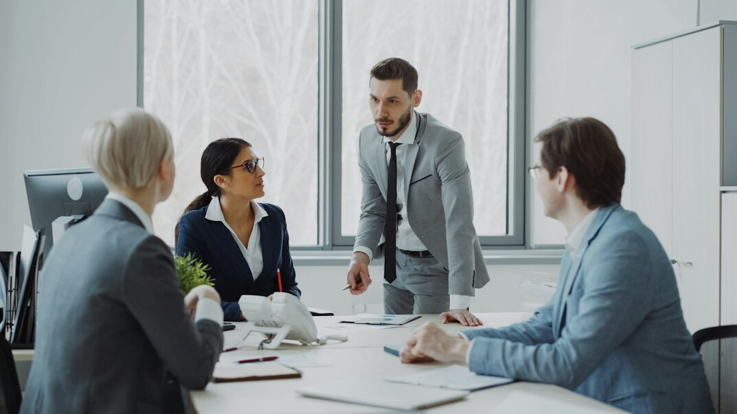 team discussion in boardroom