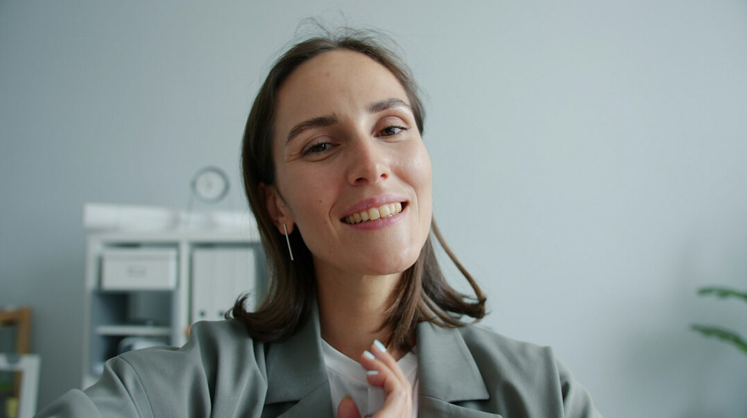business leader reflecting in office